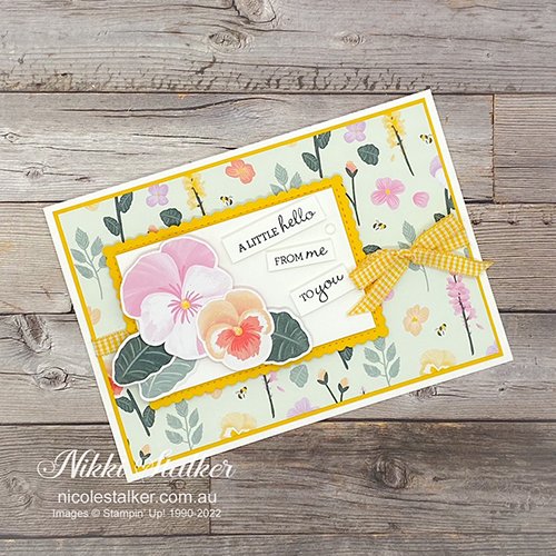Greeting card with Pansies and sentiment 'A Little Hello From Me To You"